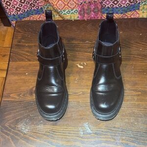 Selling a pair of Dr. Martens black leather Chelsea boots.